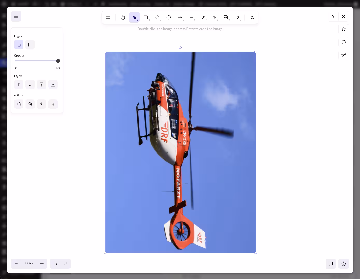 A sideways helicopter photo in the neoDraw editor before correction